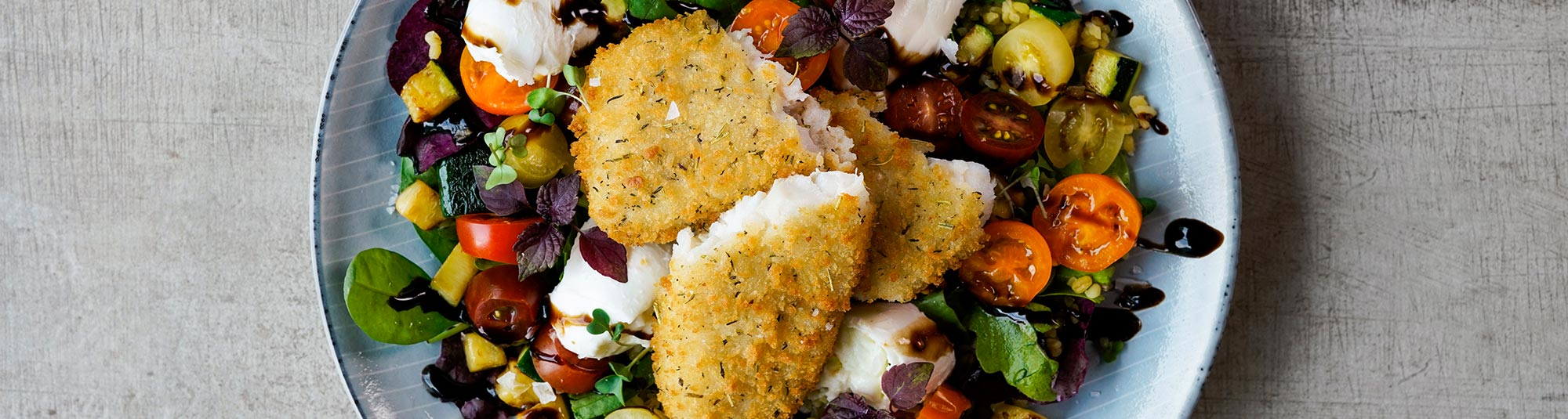 Oven visfilet Mediterraanse stijl met een salade van tomaat & mozarella 